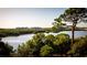 Aerial view of waterfront community with lush landscaping and condos at 9949 Key Haven Rd, Seminole, FL 33777