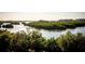 Aerial view showcasing a tranquil waterway and waterfront homes at 9949 Key Haven Rd, Seminole, FL 33777
