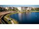 Aerial view of condo community by a lake at 9949 Key Haven Rd, Seminole, FL 33777