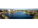 Community lake view with surrounding condos at 9949 Key Haven Rd, Seminole, FL 33777