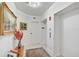 Residential hallway with elevator access and tasteful decor at 409 N Point Rd # 502, Osprey, FL 34229