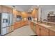 Modern kitchen with stainless steel appliances and granite counters at 409 N Point Rd # 502, Osprey, FL 34229