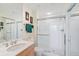 Clean bathroom with a large shower and updated vanity at 409 N Point Rd # 502, Osprey, FL 34229