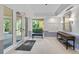 Building lobby with seating, mailboxes, and access to the outdoors at 409 N Point Rd # 502, Osprey, FL 34229