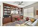 Bright home office features built-in bookshelves and a spacious desk at 409 N Point Rd # 502, Osprey, FL 34229
