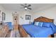 Bright main bedroom with a comfortable king-size bed at 409 N Point Rd # 502, Osprey, FL 34229