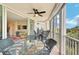 Relaxing lanai with outdoor furniture and access to the living area at 409 N Point Rd # 502, Osprey, FL 34229