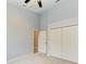 Bedroom featuring carpet flooring and double door closet at 337 Snapdragon Loop, Bradenton, FL 34212