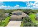 Two-story home with three-car garage and well-manicured lawn at 337 Snapdragon Loop, Bradenton, FL 34212