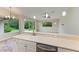 Kitchen boasts a large island with double sinks, perfect for casual dining at 337 Snapdragon Loop, Bradenton, FL 34212