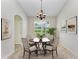 Bright dining room, ready for your table and chairs, with natural light at 337 Snapdragon Loop, Bradenton, FL 34212