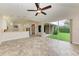 Open kitchen with breakfast bar and views to the Gathering room and backyard at 337 Snapdragon Loop, Bradenton, FL 34212