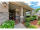 Front entry with stone accents and brick tile flooring at 337 Snapdragon Loop, Bradenton, FL 34212