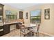 Bright kitchen with granite countertops and breakfast nook at 8104 36Th E St, Sarasota, FL 34243