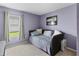 Cozy bedroom with a daybed, window with natural light, and a neutral color palette at 7407 64Th E St, Palmetto, FL 34221