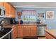 Kitchen with stainless steel appliances and a corner sink with a view at 7407 64Th E St, Palmetto, FL 34221