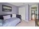 Serene bedroom with a daybed, built-in closet, and access to a hallway at 7407 64Th E St, Palmetto, FL 34221