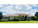 Single-Gathering home with tile roof, manicured lawn, and neutral color palette at 10228 Silverado Cir, Lakewood Ranch, FL 34202