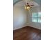 Bright office with hardwood floors, ceiling fan, and large window at 10228 Silverado Cir, Lakewood Ranch, FL 34202