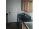 Laundry room with washer, dryer, and upper cabinets at 10228 Silverado Cir, Lakewood Ranch, FL 34202