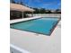 Community pool with covered seating area at 10228 Silverado Cir, Lakewood Ranch, FL 34202