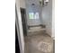 Bathroom with soaking tub, walk in shower, and tile flooring at 10228 Silverado Cir, Lakewood Ranch, FL 34202