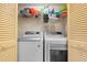 Laundry closet with washer and dryer at 6505 Stone River Rd # 101, Bradenton, FL 34203