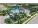 Community pool with cabanas and surrounding landscape at 13212 Deep Blue Pl, Lakewood Ranch, FL 34211