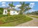 Entrance to Indigo at Lakewood Ranch community with landscaping and signage at 13212 Deep Blue Pl, Lakewood Ranch, FL 34211