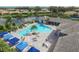 Resort-style pool with lounge chairs and umbrellas at 13212 Deep Blue Pl, Lakewood Ranch, FL 34211