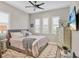 Serene bedroom with a comfortable bed and plenty of natural light at 13212 Deep Blue Pl, Lakewood Ranch, FL 34211