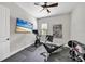 Home gym with exercise bike, rowing machine, and weights at 13212 Deep Blue Pl, Lakewood Ranch, FL 34211