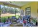 Relaxing screened patio with outdoor grill and seating area at 13212 Deep Blue Pl, Lakewood Ranch, FL 34211