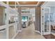 Bright and spacious entryway with tile flooring, mirrors, and views into the living areas at 13212 Deep Blue Pl, Lakewood Ranch, FL 34211