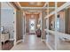 Bright and spacious entryway with tile flooring and mirrors at 13212 Deep Blue Pl, Lakewood Ranch, FL 34211