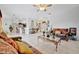 Living room with view of kitchen and comfortable seating at 6122 44Th E Ct, Bradenton, FL 34203