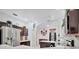 Modern kitchen with stainless steel appliances and dark wood cabinets at 6122 44Th E Ct, Bradenton, FL 34203