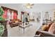 Living room with view of dining area and access to backyard at 6122 44Th E Ct, Bradenton, FL 34203