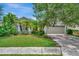 Landscaped one story home with a two car garage at 6122 44Th E Ct, Bradenton, FL 34203