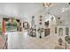 Bright dining room features a wood table with six chairs, chandelier, and decorative wall accents at 6122 44Th E Ct, Bradenton, FL 34203