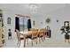Dining area with wood table and chairs, decorative accents, and natural light at 6122 44Th E Ct, Bradenton, FL 34203