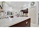 Kitchen boasts an island, ample counter space, dark wood cabinets, and a pantry at 6122 44Th E Ct, Bradenton, FL 34203