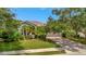 One story home with a two car garage and lush landscaping at 6122 44Th E Ct, Bradenton, FL 34203
