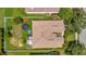 Aerial view of house showing backyard, fenced in area, and screened patio at 6122 44Th E Ct, Bradenton, FL 34203