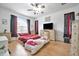 Large main bedroom with wood floors, a comfortable bed, and plenty of closet space at 6122 44Th E Ct, Bradenton, FL 34203