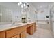 Double vanity bathroom with garden tub and separate shower at 6122 44Th E Ct, Bradenton, FL 34203