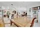 Spacious dining room with large table, chairs and views to living and kitchen areas at 6122 44Th E Ct, Bradenton, FL 34203