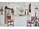 Modern kitchen with stainless steel appliances and a breakfast bar at 6122 44Th E Ct, Bradenton, FL 34203