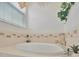 Relaxing bathroom with soaking tub and separate shower at 6122 44Th E Ct, Bradenton, FL 34203