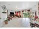 Spacious living area with tile floors, sliding doors to patio, and comfortable furniture at 6122 44Th E Ct, Bradenton, FL 34203